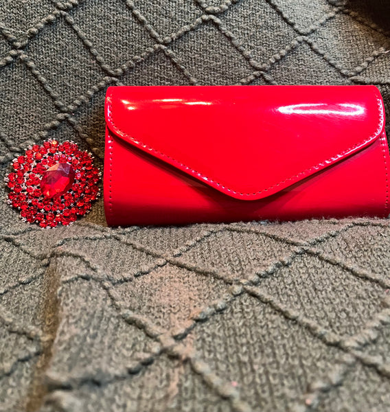 "HANDS ON CLUTCH", BRIGHT RED (Brooch sold separately)
