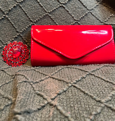 "HANDS ON CLUTCH", BRIGHT RED (Brooch sold separately)